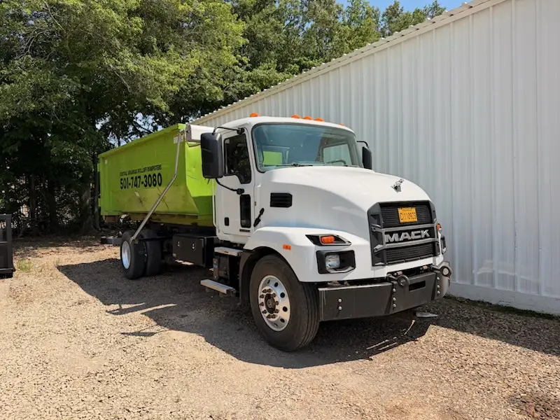Central Arkansas Rolloff Dumpsters team providing roll-off dumpster delivery service